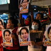 NLD supporters celebrate in front of the party's headquarters in Yangon following a landslide victory in the November 2020 election (Photo: YE AUNG THU/AFP via Getty Images)