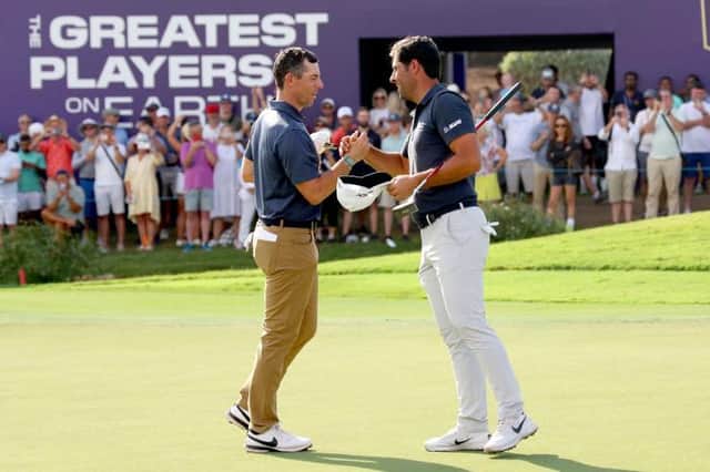 Rory McIlroy and Adrian Otaegui shake hands after finishing their second round in last week's DP World Tour Championship on the Earth Course at Jumeirah Golf Estates in Dubai. Picture: Andrew Redington/Getty Images.