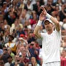 Andy Murray takes the acclaim of the Wimbledon crowd following his win over Ryan Peniston.