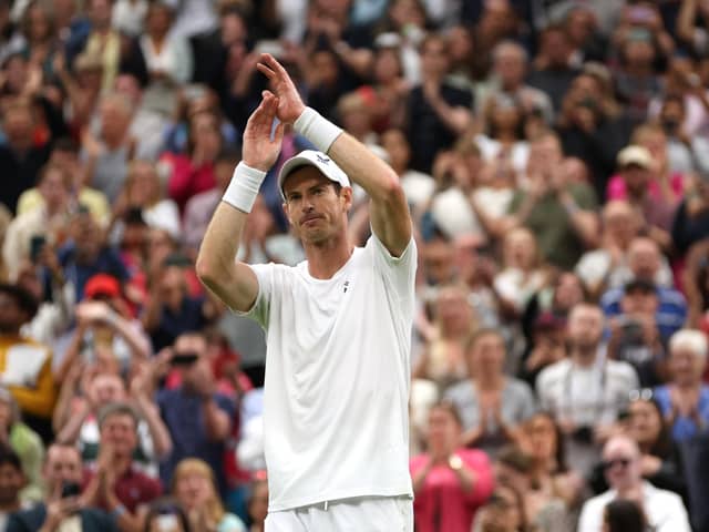 Andy Murray takes the acclaim of the Wimbledon crowd following his win over Ryan Peniston.