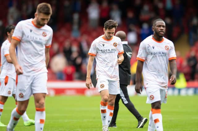 Dundee United's players trudge off at full-time after losing 2-0 to Aberdeen on opening weekend. Picture: SNS