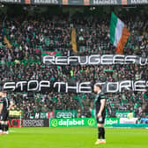 The Green Brigade banner protesting the government's small boat legislation was warmly received by supporters in all corners of Celtic Park. (Photo by Ewan Bootman / SNS Group)