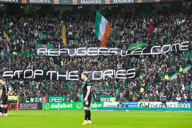 The Green Brigade banner protesting the government's small boat legislation was warmly received by supporters in all corners of Celtic Park. (Photo by Ewan Bootman / SNS Group)