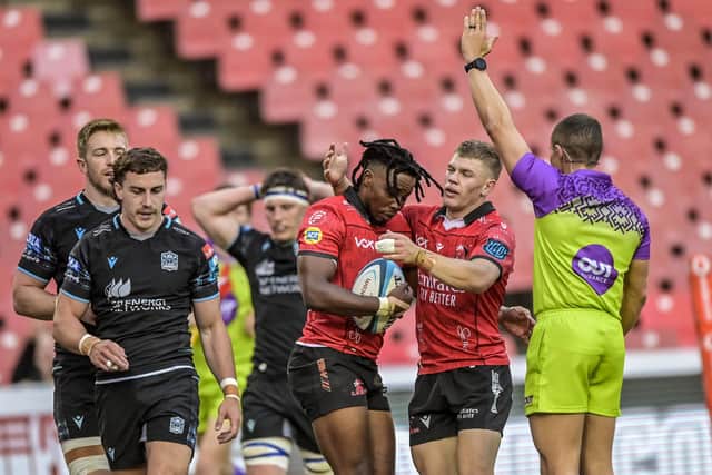 Disappointment for Glasgow Warriors in Johannesburg as Emirates Lions' Rabz Maxwane and Morne van den Berg celebrate the former's try. (Photo by Steve Haag Sports/INPHO/Shutterstock)