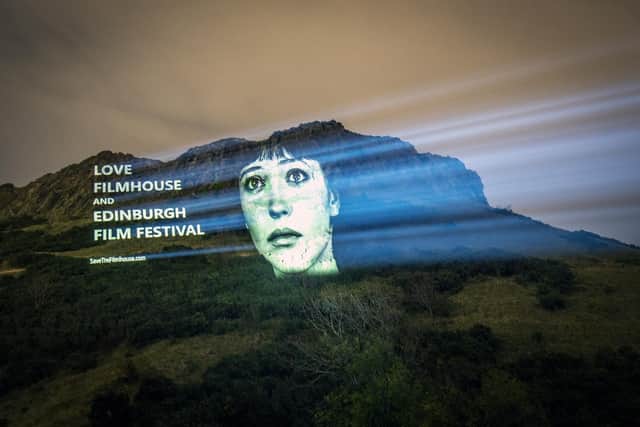 An image of actor Anna Karina from the film Vivre Sa Vie was projected onto Salisbury Crags in Edinburgh last autumn as part of a campaign to save the Edinburgh International Film Festival and the Filmhouse cinema in the city. (Picture: Jane Barlow/PA)