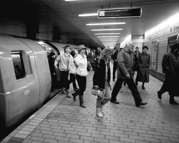 Passengers leaving the subway train at St Enboch underground station in Glasgow, December 1986.