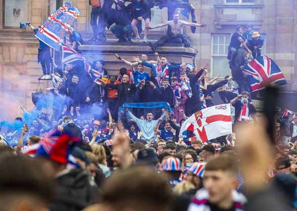 Rangers fans gather in George Square to celebrate the Ibrox club's title success
Rangers fans gather at George Square this afternoon after Rangers lift The SPFL Premier League Cup on the last day of the season