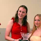 Club captains Libby Ballantyne and Molly Ramsay with the swim gala trophy.