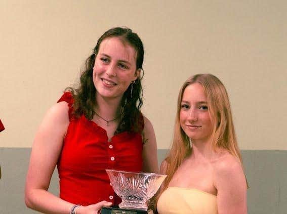 Club captains Libby Ballantyne and Molly Ramsay with the swim gala trophy.