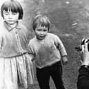 Robert Blomfield, 'Robert Blomfield Photographing Children, Edinburgh', 1966.