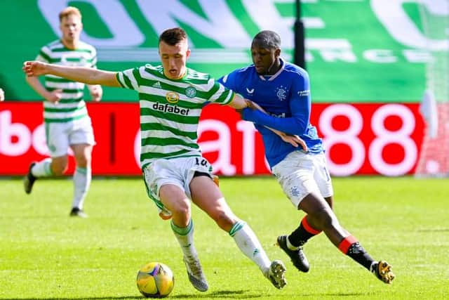 Celtic's David Turnbull and Glen Kamara of Rangers tussle for midfield superiority during the Old Firm match at Celtic Park on Sunday. (Photo by Rob Casey / SNS Group)