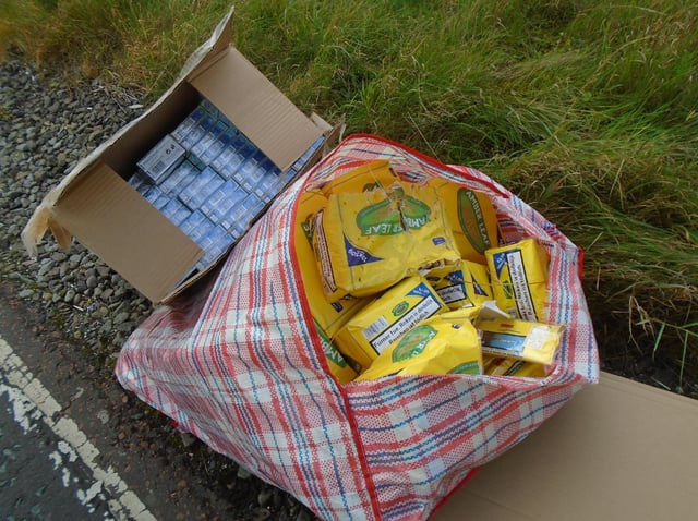 He stashed the cigarettes and tobacco in laundry bags and cardboard boxes.