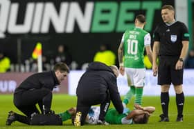Hibs midfielder Josh Campbell goes down injured during the league clash with Hearts at Easter Road. Photo by Alan Harvey / SNS Group
