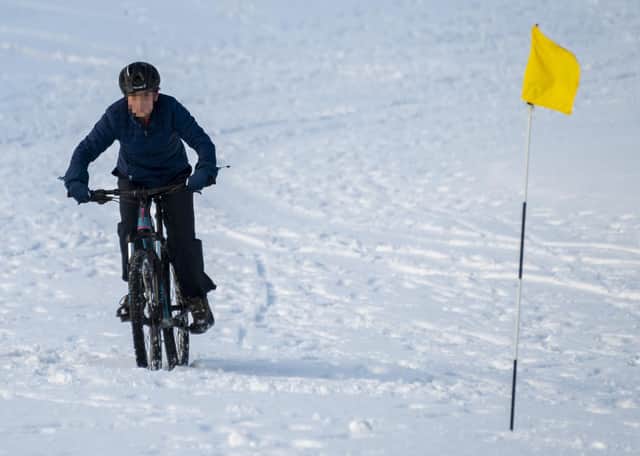 A mountain biker on the Braids course in Edinburgh during the recent cold snap in Scotland. Picture: Andrew O'Brien.