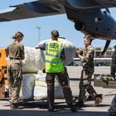 DFID - UK Department for International Development
UK aid shelter kits being unloaded from a Royal Air Force A400M flight at Beira airport, Mozambique, for people affected by Cyclone Idai, 26 March 2019
UK aid shelter kits being unloaded from a Royal Air Force A400M flight at Beira airport, Mozambique, for people affected by Cyclone Idai, 26 March 2019.

 

Picture: IOM
