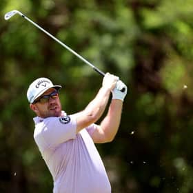 Richie Ramsay plays his second shot on the 14th hole during day one of the Nedbank Golf Challenge at Gary Player CC in Sun City, South Africa. Picture: Warren Little/Getty Images.