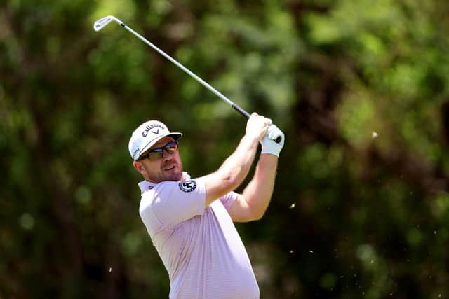 Richie Ramsay plays his second shot on the 14th hole during day one of the Nedbank Golf Challenge at Gary Player CC in Sun City, South Africa. Picture: Warren Little/Getty Images.