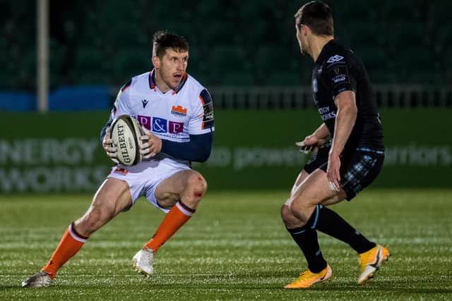 Mark Bennett on the attack for Edinburgh against Glasgow Warriors during last season's 1872 Cup match at Scotstoun in January. (Photo by Ross Parker / SNS Group)