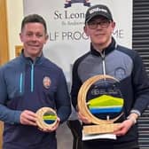 Bathgate's James Wood, right, shows off The Foundations Trophy alongside Fintan Bonner, the St Leonards School in St Andrews golf coach, after his nine-shot success at Blairgowrie. Picture: SGF