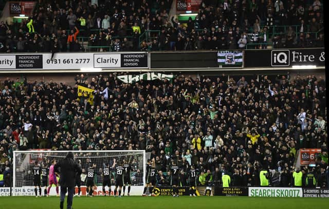 Celtic players celebrate in front of their fans after the 3-1 win over Hibs at Easter Road. (Photo by Paul Devlin / SNS Group)