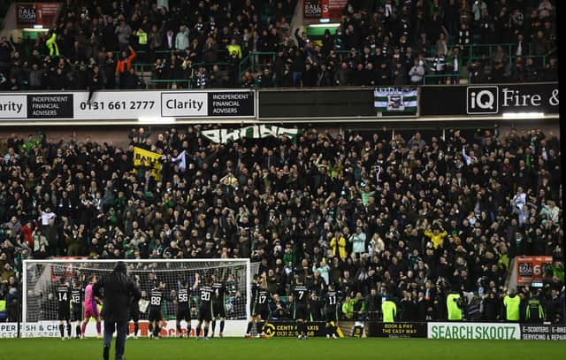 Celtic players celebrate in front of their fans after the 3-1 win over Hibs at Easter Road.  (Photo by Paul Devlin / SNS Group)