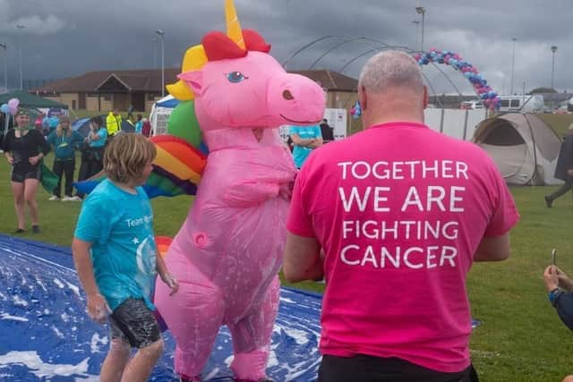 The heavy downpours didn't deter those taking part.