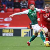 Celtic manager Ange Postecoglou has admiration for how Hibs' Martin Boyle has handled playing for the Socceroos team he previously managed, the winger here seen challenging Jonny Hayes during  the Leith club's losst at Aberdeen. (Photo by Craig Williamson / SNS Group)