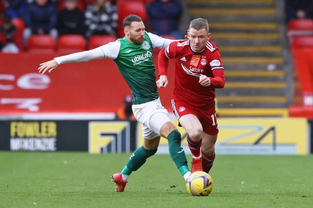 Celtic manager Ange Postecoglou has admiration for how Hibs' Martin Boyle has handled playing for the Socceroos team he previously managed, the winger here seen challenging Jonny Hayes during the Leith club's losst at Aberdeen. (Photo by Craig Williamson / SNS Group)