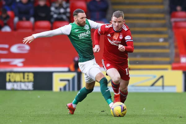 Celtic manager Ange Postecoglou has admiration for how Hibs' Martin Boyle has handled playing for the Socceroos team he previously managed, the winger here seen challenging Jonny Hayes during  the Leith club's losst at Aberdeen. (Photo by Craig Williamson / SNS Group)
