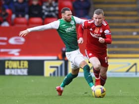 Celtic manager Ange Postecoglou has admiration for how Hibs' Martin Boyle has handled playing for the Socceroos team he previously managed, the winger here seen challenging Jonny Hayes during  the Leith club's losst at Aberdeen. (Photo by Craig Williamson / SNS Group)