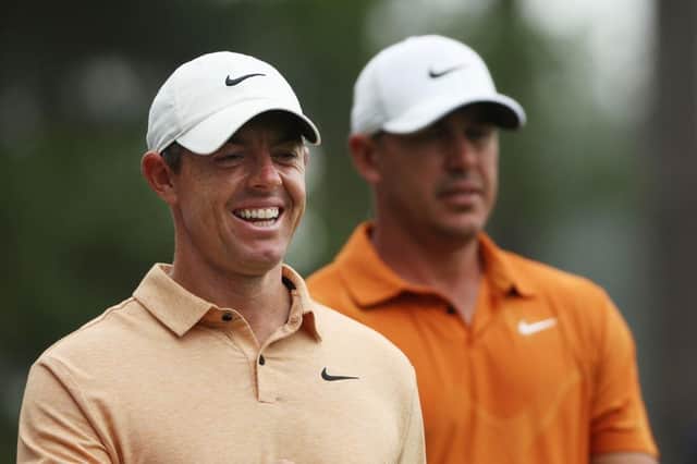 Rory McIlroy and Brooks Koepka, one of the LIV Golf players in the field, during a practice round prior to the 2023 Masters at Augusta National Golf Club. Picture Patrick Smith/Getty Images.