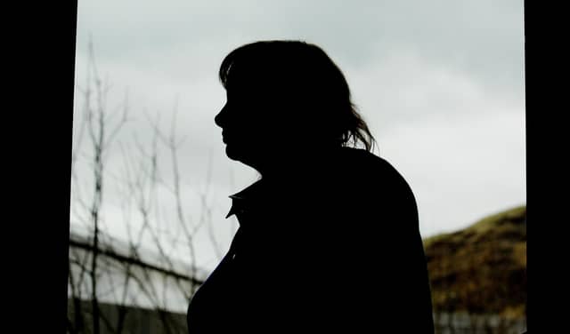 A woman who gave evidence to MSPs about what it was like to be stalked but who wished to remain anonymous (Picture: Neil Hanna)