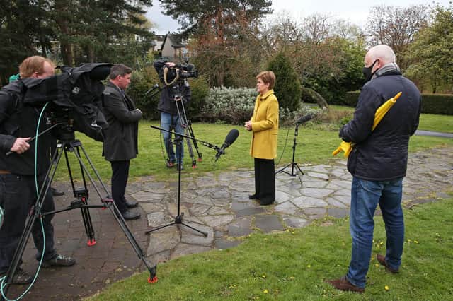 First Minister Nicola Sturgeon speaks to the media during a visit to Airdrie the day after her party won a fourth consecutive election.