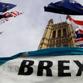 A pro-Brexit banner is seen outside the Houses of Parliament in London. Picture: Tolga Akmen/AFP via Getty Images