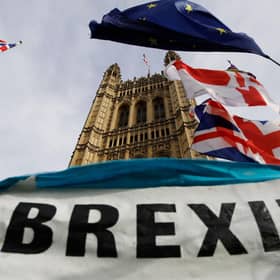 A pro-Brexit banner is seen outside the Houses of Parliament in London. Picture: Tolga Akmen/AFP via Getty Images