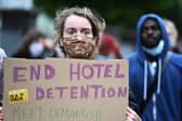 Protesters called for an end to the detention of asylum seekers in hotels after six people were injured in a knife attack at Park Inn Hotel in Glasgow in June 2020.