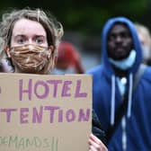 Protesters called for an end to the detention of asylum seekers in hotels after six people were injured in a knife attack at Park Inn Hotel in Glasgow in June 2020.