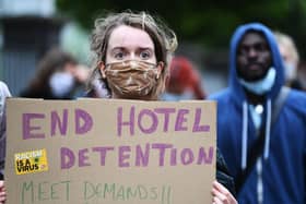 Protesters called for an end to the detention of asylum seekers in hotels after six people were injured in a knife attack at Park Inn Hotel in Glasgow in June 2020.