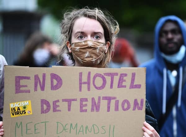 Protesters called for an end to the detention of asylum seekers in hotels after six people were injured in a knife attack at Park Inn Hotel in Glasgow in June 2020.