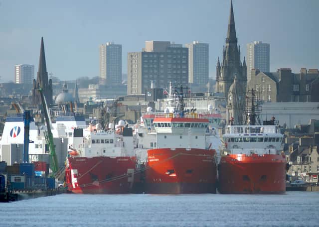 Boats and oil rig supply vessels in Aberdeen Harbour.