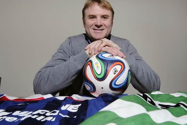 Tommy Coyne with his old Dundee and Celtic shirts at his home in Glasgow in 2015