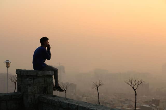 Smog obscures the view from the Saad Abad mountain north of the Iranian capital Tehran in January this year (Picture: Atta Kenare/AFP via Getty Images)