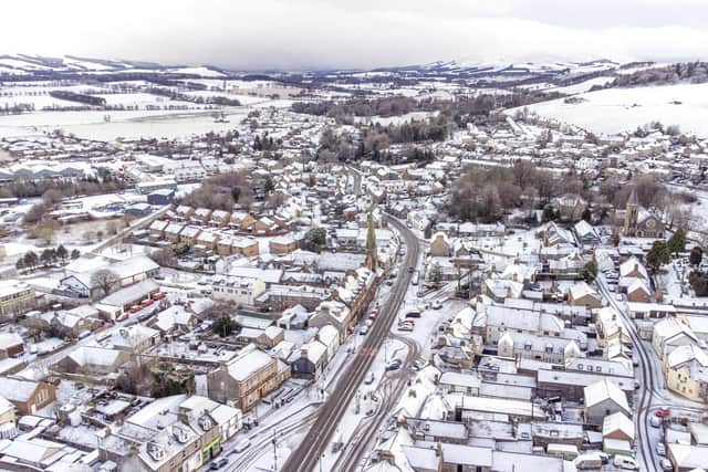 Snow fall in Biggar in South Lanarkshire. A yellow alert for snow and ice has been issued by the Met Office for most of Scotland until 1800 hours tonight. Picture date: Monday December 26, 2022.
