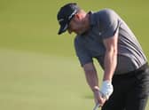 Marc Warren plays his second shot on the 11th hole in the second round of the Abu Dhabi HSBC Championship at Yas Links. Picture: Ross Kinnaird/Getty Images.