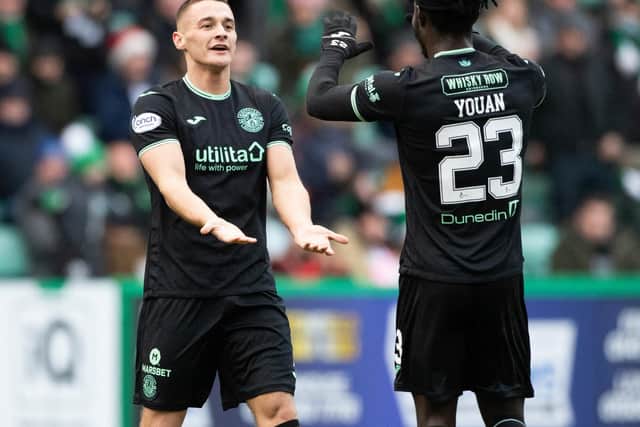 Kyle Magennis celebrates with Hibs team-mate Elie Youan after netting the third goal in the 4-0 win over Livingston. (Photo by Paul Devlin / SNS Group)