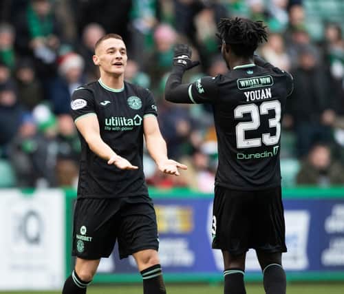 Kyle Magennis celebrates with Hibs team-mate Elie Youan after netting the third goal in the 4-0 win over Livingston. (Photo by Paul Devlin / SNS Group)