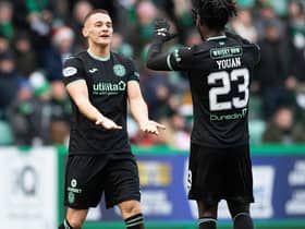 Kyle Magennis celebrates with Hibs team-mate Elie Youan after netting the third goal in the 4-0 win over Livingston. (Photo by Paul Devlin / SNS Group)
