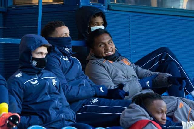 Rangers' Alfredo Morelos (R) and captain James Tavernier watch on during a Scottish Cup Third Round tie between Rangers and Cove Rangers at Ibrox Stadium, on April 04, 2021, in Glasgow, Scotland. (Photo by Alan Harvey / SNS Group)