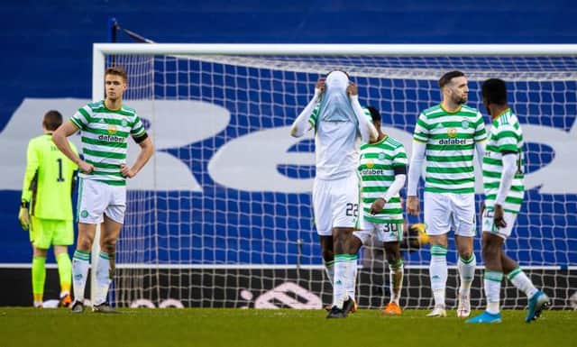 Celtic's Kristoffer Ajer, Odsonne Edouard and Shane Duffy look frustrated after the openin goal during a Scottish Premiership match between Rangers and Celtic at Ibrox Stadium, on January 02, 2021, in Glasgow, Scotland (Photo by Craig Williamson / SNS Group)