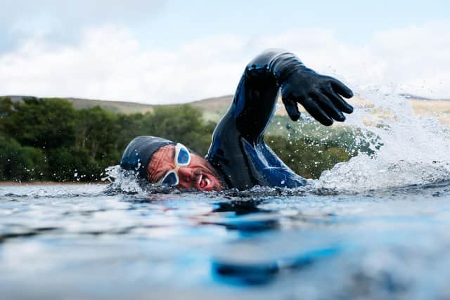 Ross Edgley has broken the record for the longest ever open water swim in Loch Ness.